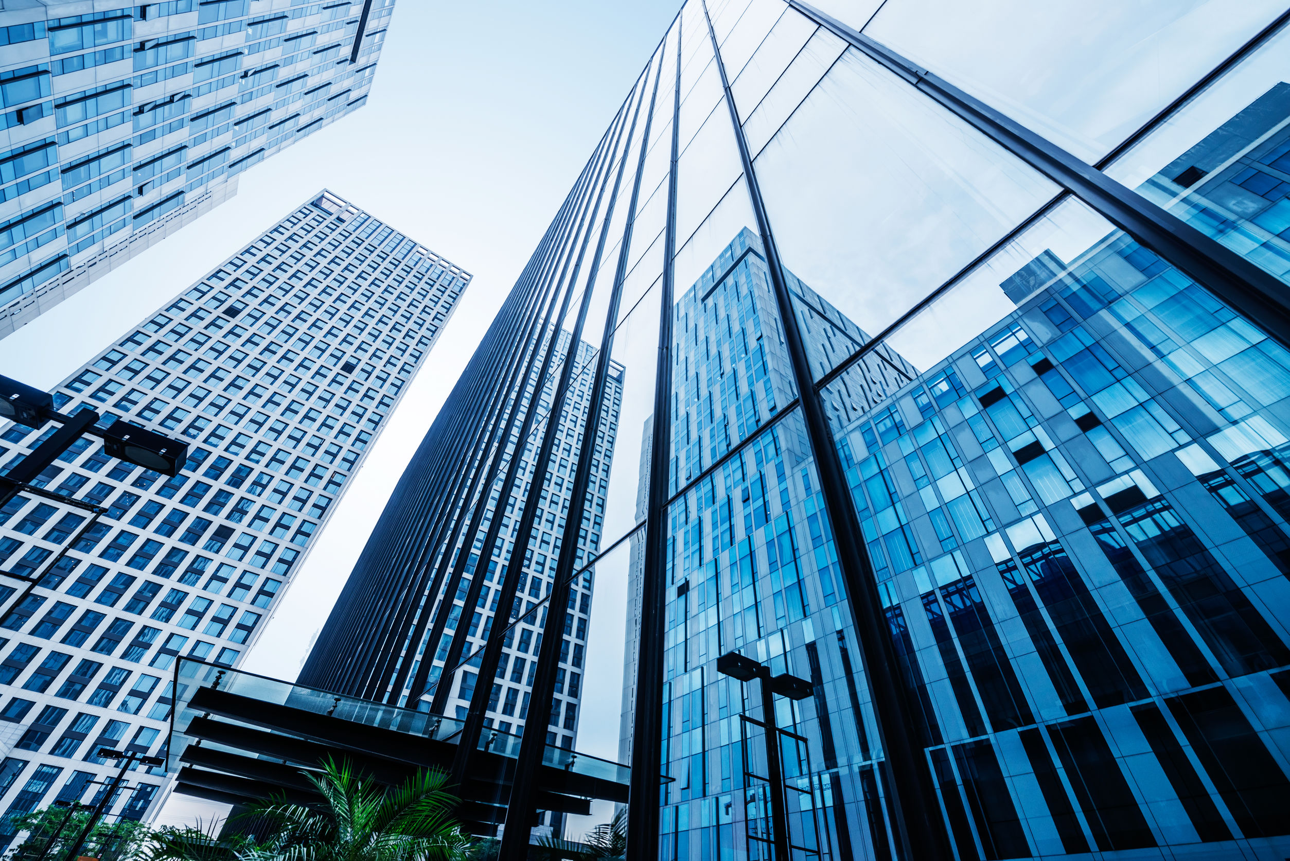 A view of some buildings from below the ground.